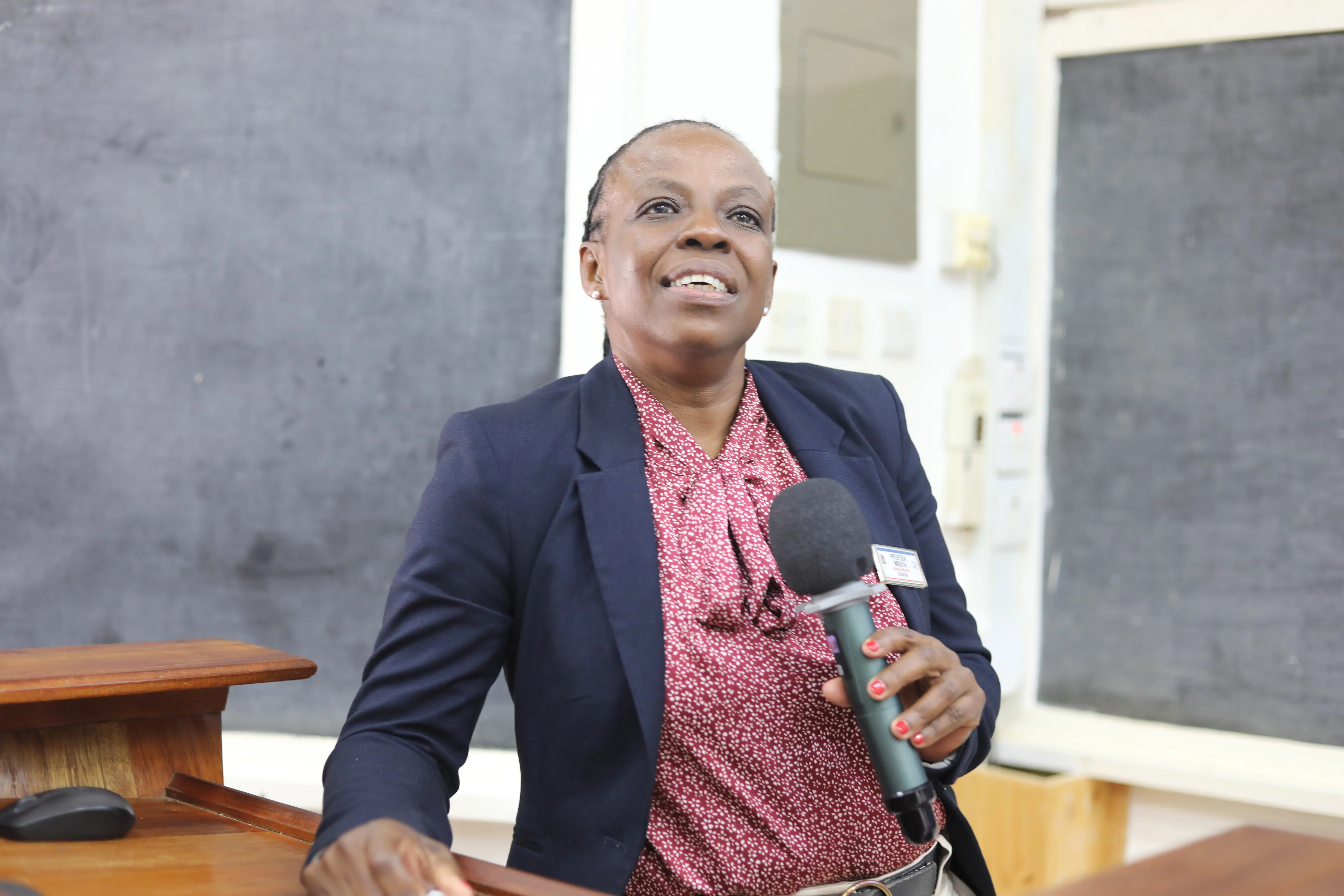 Prof. Sia Msuya congratulating Dr. Rune Philemon